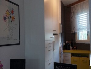 Fridge, oven, dishwasher, cookware/dishes/utensils - Center Communal / Herrmann, (Laax Dorf). 3.5 Zimmerwohnung by Interhome (Laax)