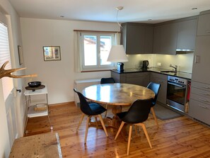 Fridge, oven, dishwasher, cookware/dishes/utensils - Charmantes Alpen-Appartement in Conters, (Conters), by Interhome (Conters)