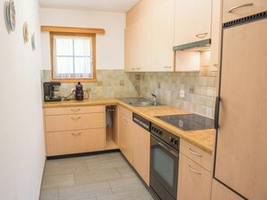 Fridge, oven, dishwasher, cookware/dishes/utensils - Casa Panorama Camartin, Brigels, (Breil/Brigels). by Interhome (Breil/Brigels)