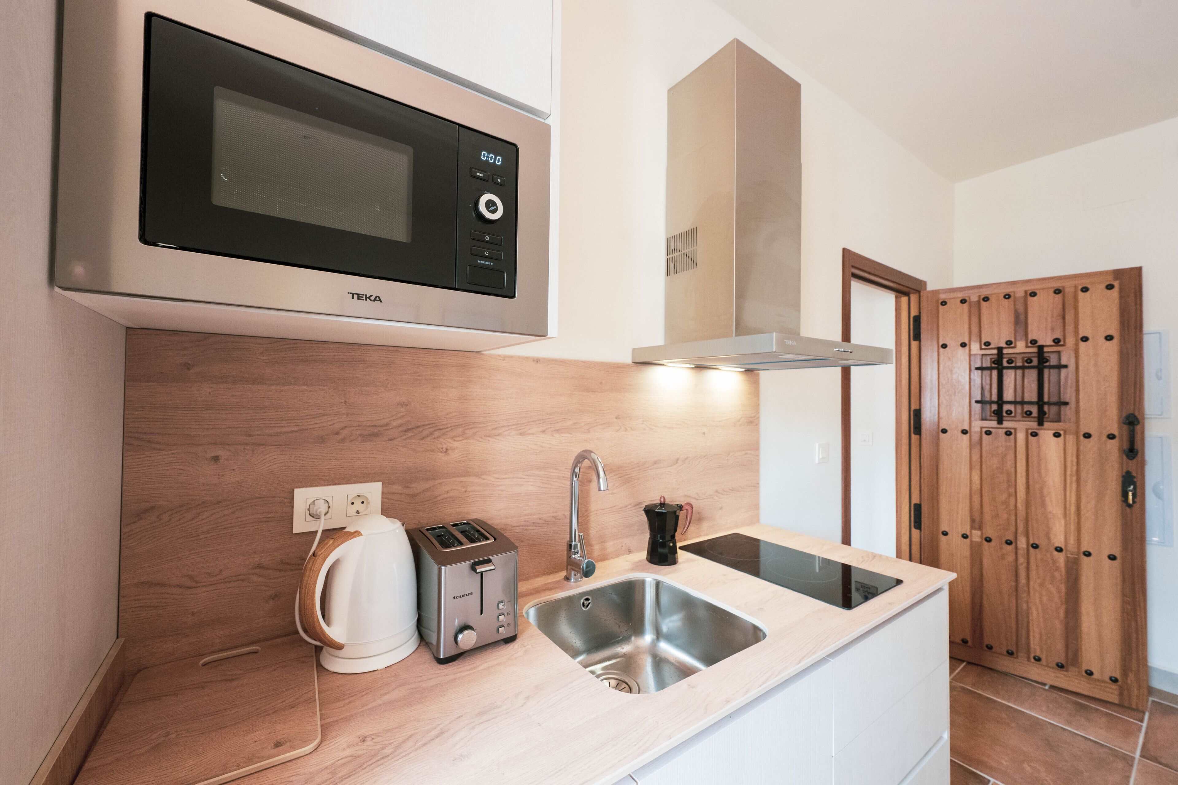 Fridge, microwave, coffee/tea maker, toaster