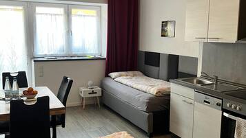 Apartment | Schallisolierte Zimmer, Babybetten, kostenloses WLAN, Bettwäsche