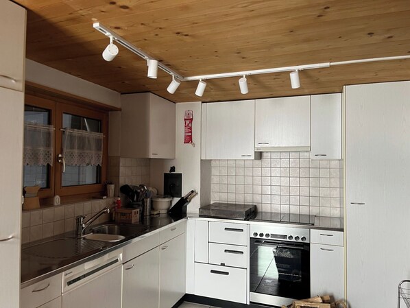 Fridge, oven, dishwasher, cookware/dishes/utensils - Ferienhaus Runs, Camuns, (Camuns), 13001B by Interhome (Camuns)