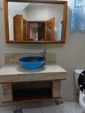 Shower, towels, soap, toilet paper