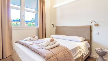 1 habitación, tabla de planchar con plancha, wifi gratis y ropa de cama