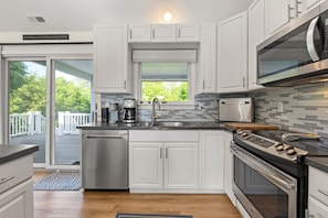 Fridge, microwave, oven, stovetop - Moon Jelly Manor: Fenced Yard | Pickleball Court Access (Southern Shores)
