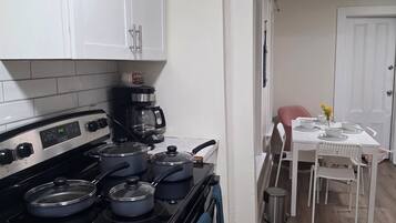 Coffee/tea maker, fridge, microwave, oven