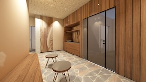 A modern interior with a stone floor, wooden panel walls, and a sliding glass door. - Premium Apartment 4 with Balcony and Breakfast Included – new 2026 (Trodena nel Parco naturale)