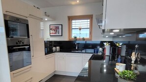 Fridge, microwave, oven, dishwasher - Chasa Scandella, (Sent) by Interhome (Sent)