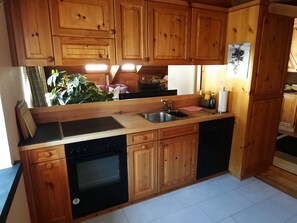 Fridge, oven, dishwasher, cookware/dishes/utensils - Chasa Solena, (Susch). by Interhome (Susch)