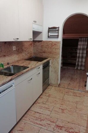 Fridge, oven, dishwasher, cookware/dishes/utensils - Chasa Minschuns 16, (Tschierv). by Interhome (Tschierv)