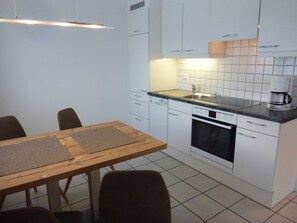 Fridge, oven, dishwasher, cookware/dishes/utensils - Appartements Alpin Live, (Samnaun-Laret). by Interhome (Samnaun)