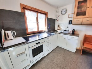 Fridge, microwave, oven, cookware/dishes/utensils - Via Imperiala, (Müstair). by Interhome (Müstair)