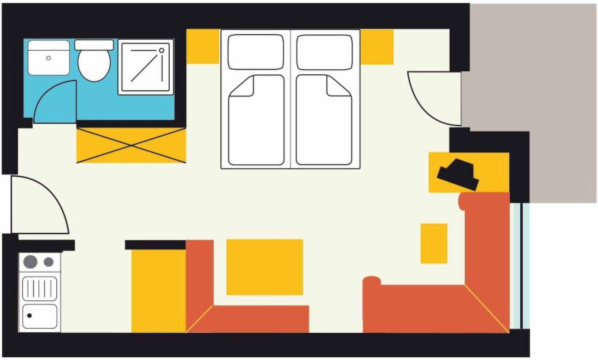 Plano de planta con cocina, comedor y dos dormitorios.