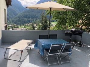 Outdoor dining - Chasa Beliur, (Scuol). by Interhome (Scuol)
