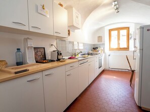 Fridge, microwave, oven, dishwasher - Ferienwohnungen Chasa Werro, (Sent) by Interhome (Sent)