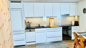 Private kitchen - 3-Zimmerwohnung Chasa d'Uina, (Sent) by Interhome (Sent)