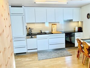 Private kitchen - 3-Zimmerwohnung Chasa d'Uina, (Sent) by Interhome (Sent)