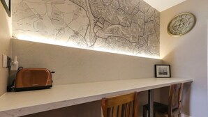 A kitchen with a map, a toaster, and a clock on the wall. - Old Market Studios-No1 (City of Bristol)