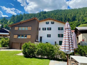 Outdoor dining - Ferienwohnungen Chà d’Immez, (Müstair). by Interhome (Müstair)