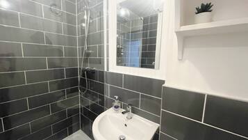 Shower, hair dryer, shampoo