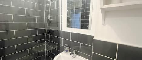 Shower, hair dryer, shampoo