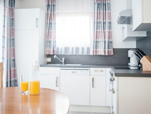 Fridge, oven, dishwasher, cookware/dishes/utensils - Appartements Alouette, (Samnaun-Dorf). by Interhome (Samnaun)
