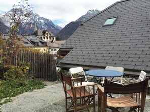 Outdoor dining - Chasa d'Uina, (Sent). by Interhome (Sent)