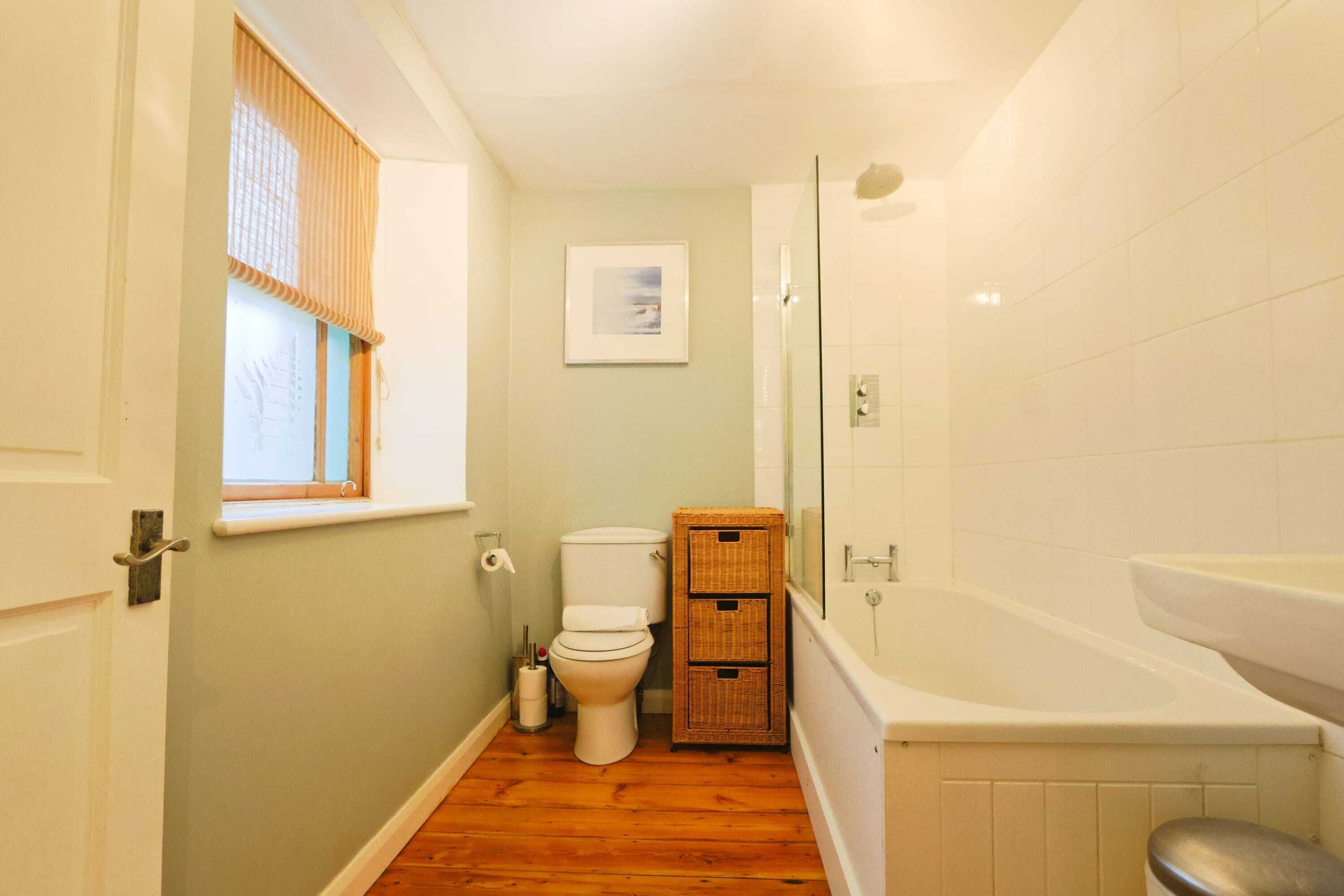 Shower, hair dryer, towels, shampoo