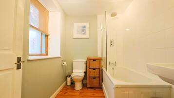 Shower, hair dryer, towels, shampoo