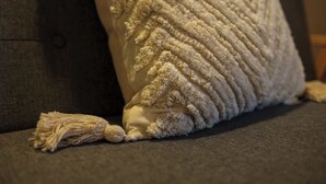A close-up of a textured pillow on a couch. - The Willow - Studio 33 (Patchway)