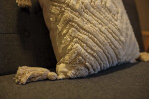 A close-up of a textured pillow on a couch. - The Willow - Studio 33 (Patchway)