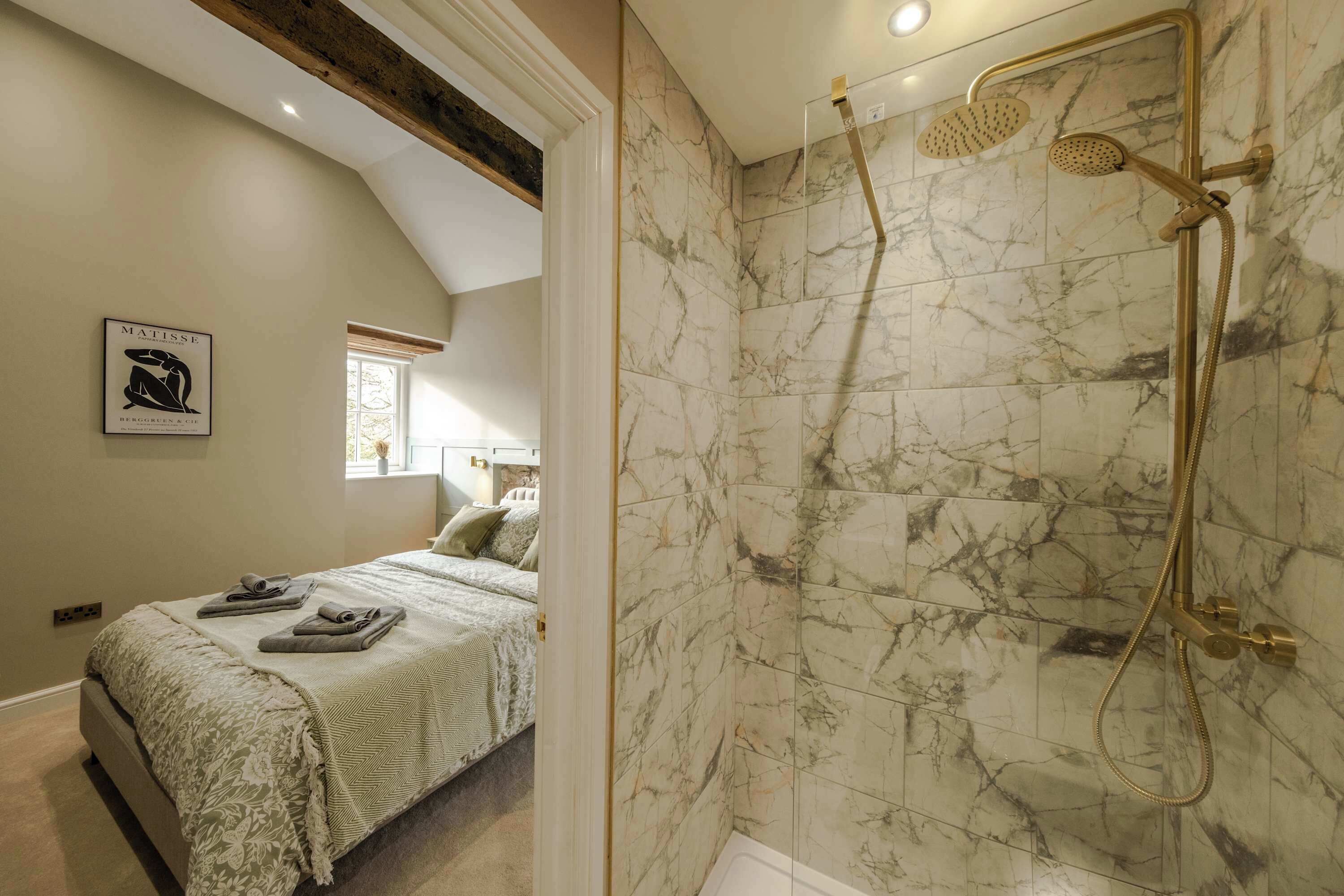 Shower, hair dryer, towels, shampoo