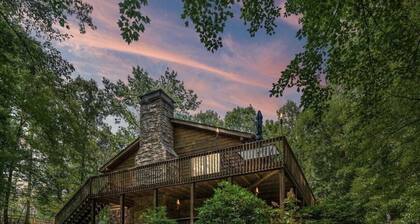 Cozy Waterfront Log Cabin Retreat on a Quiet Creek