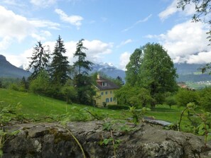 A house surrounded by greenery and mountains in the background. - Haus Noains, (Rodels), by Interhome (Sils im Domleschg)