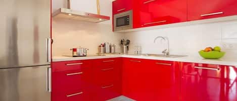 Fridge, microwave, cookware/dishes/utensils
