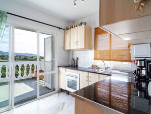 Fridge, microwave, oven, cookware/dishes/utensils - Sunny Terrace Chimenea by Casasol by Interhome (Nerja)