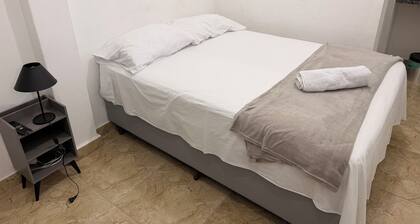 Private studio with TV and private bathroom.