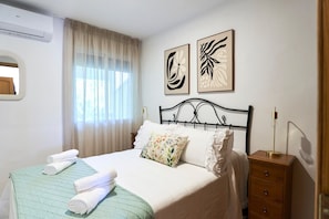2 bedrooms, iron/ironing board, WiFi, bed sheets
