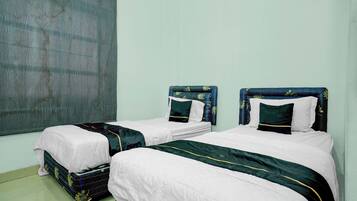 Chambre Deluxe avec lits jumeaux | Literie de qualité, accès au Wi-Fi (inclus), literie fournie
