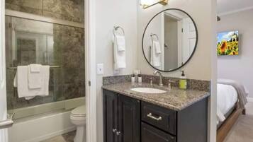 Shower, hair dryer, towels