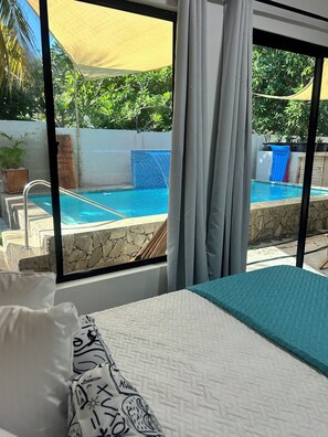 Pool - Blue Horizon Room 2 cozy 1-bedroom studio in tranquil Taminique with AC (Taminique)