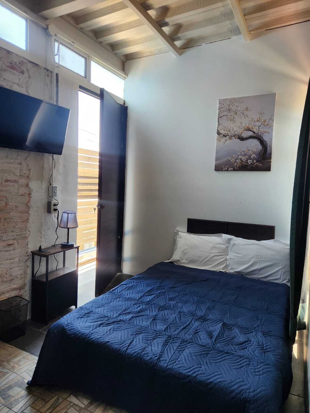 Quarto básico, vista para a cidade