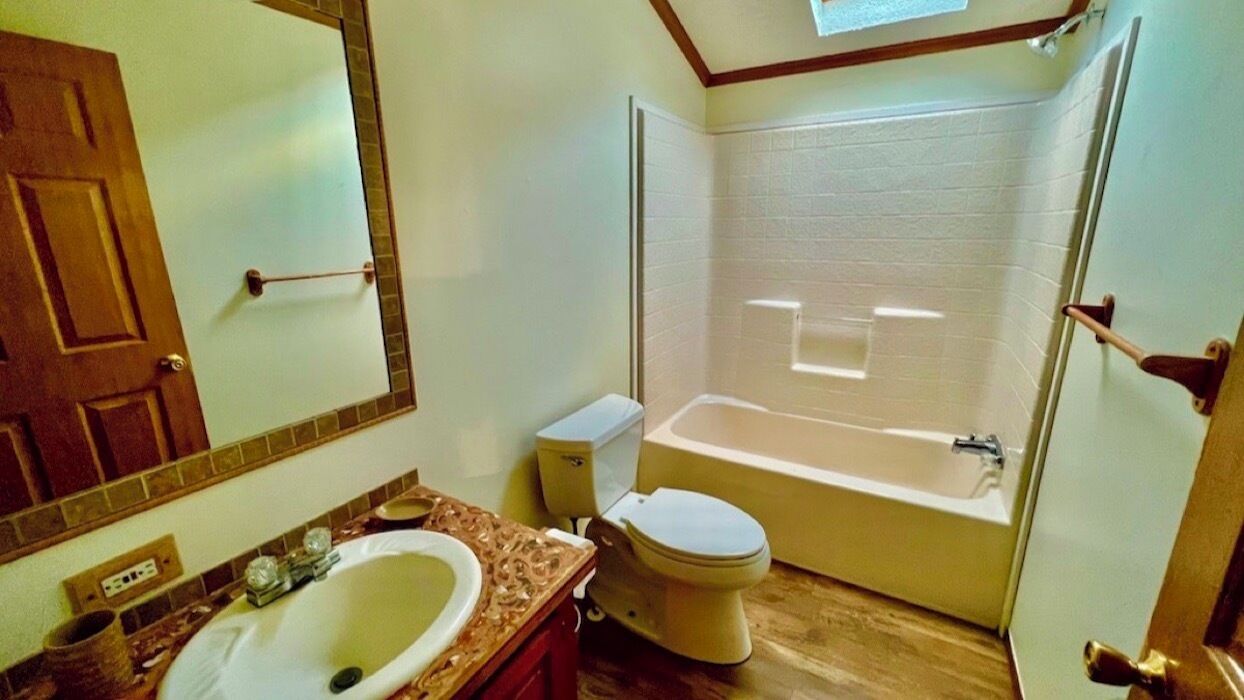 Jetted tub, soap, toilet paper
