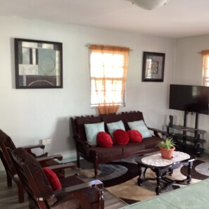 Living area - Lovely Cozy 2-bedroom house in quiet Black Bay Area for your peaceful getaway (Vieux Fort)