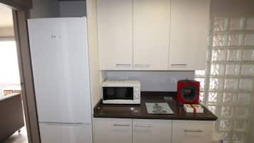 Fridge, microwave, oven, cookware/dishes/utensils