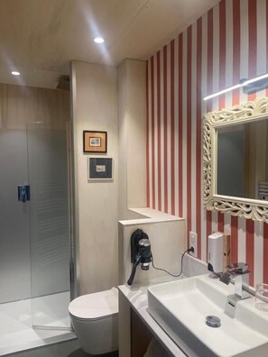 Double Room, Balcony, Garden View | Bathroom | Shower, free toiletries, hair dryer, towels