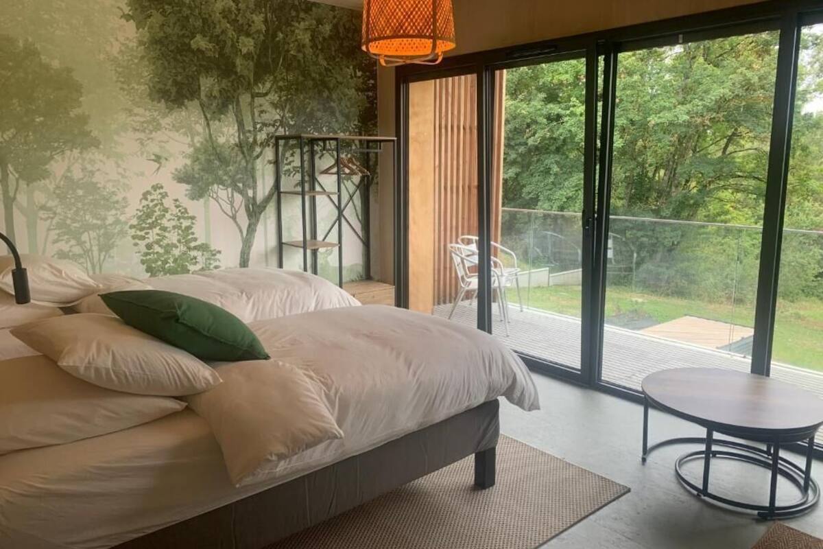 Habitación con 1 cama matrimonial o 2 individuales, balcón, vista al jardín