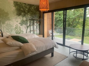 ห้องดับเบิลหรือทวิน, ระเบียง, วิวสวน | โต๊ะทำงาน, พื้นที่ทำงานแบบใช้แล็ปท็อป, Wi-Fi ฟรี