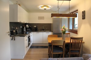 Private kitchen - Vacation apartment with its own sauna (Hofsgrund)