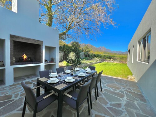 New Listing! Breathtaking views of Jonkershoek valley mountains and vineyards.